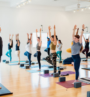Jamaica Plain yoga students practicing yoga flow